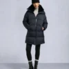 Belle Dune lang shearling-trimmet pufferjakke